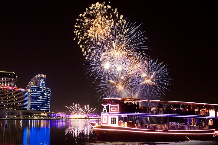 Experience a magical New Year's Eve dinner cruise enjoying stunning views of Dubai's skyline and a spectacular fireworks display over the Burj Khalifa all while savoring a gourmet buffet.